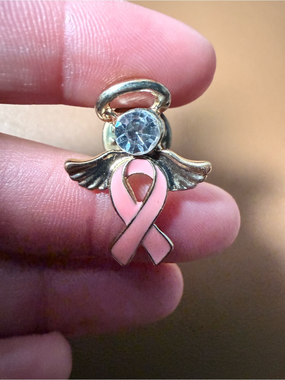 Gold-Tone Angel Ribbon Brooch with Pink Enamel and Crystal Accent